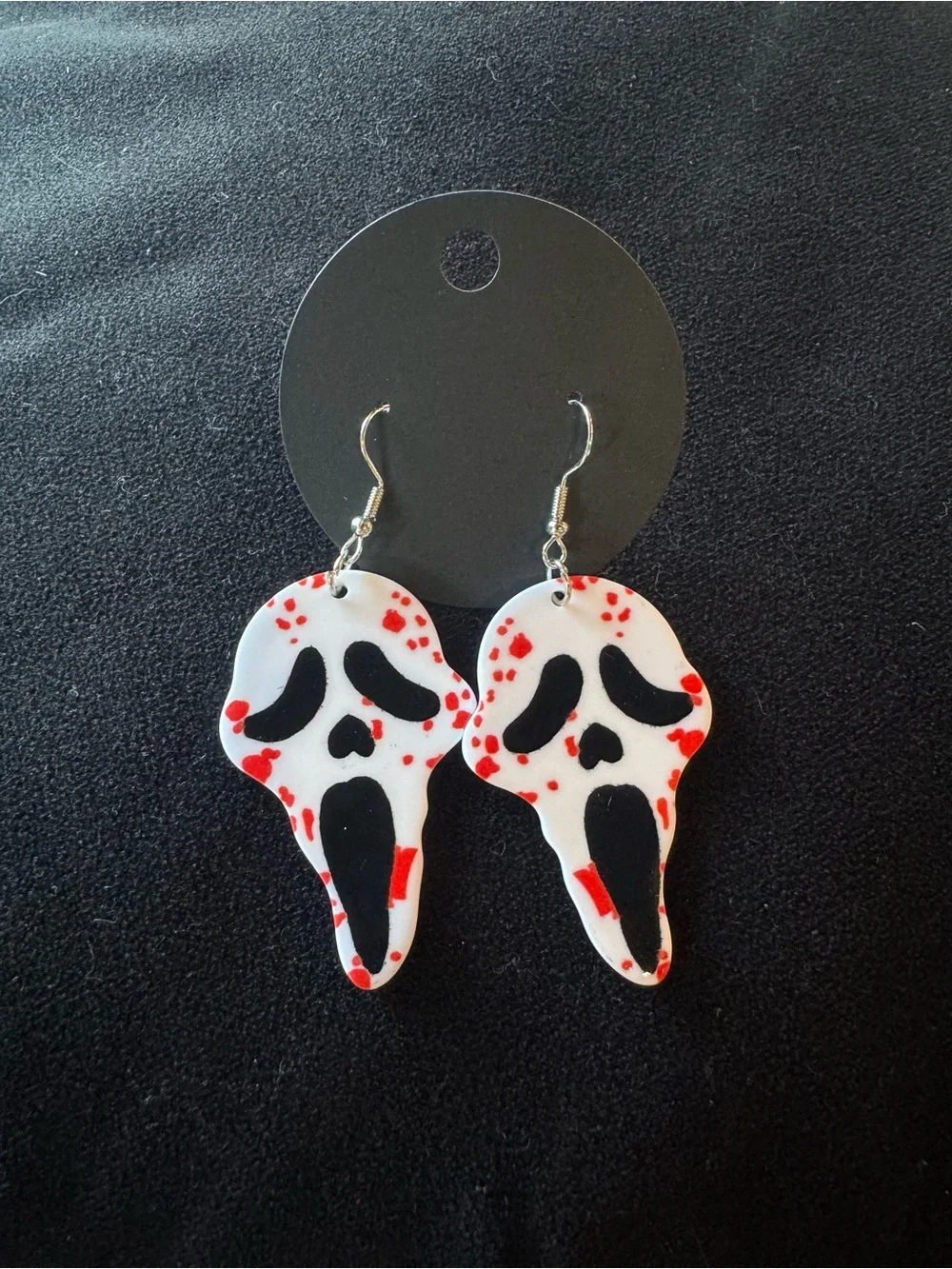 White & Black Scream Skull Earrings with Red Accents